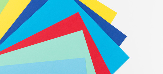 Colored paper on white background