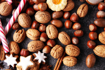 Decoration with christmas cookies. Typical cinnamon stars with fruits and nuts.
