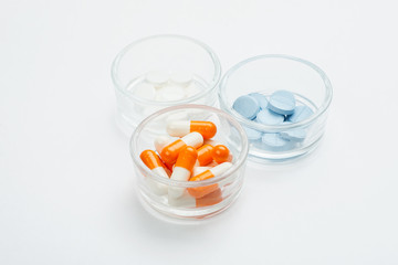 Medications and pills on a white background closeup shot