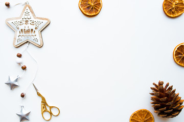 Christmas decorations on white background. New Year frame with free copy space. Flat lay, top view
