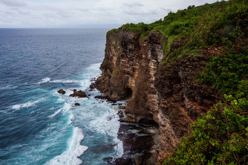 View to the cliffs at Uluvatu view point on Bali, Indonesia