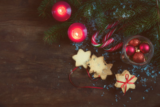Christmas and New Year composition on dark wooden background with copy space top view.