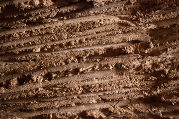 Grobe Lehm Streifen Textur einer Wand