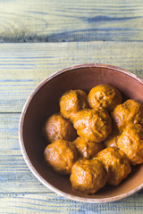 Bowl of turkey meatballs with curry sauce