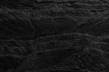 Dark grey black slate background or texture.