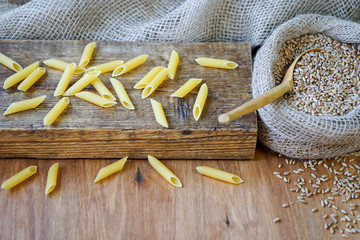 On the table, the paste is scattered on the wooden surface.
