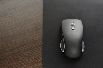 New wireless computer mouse on the desktop