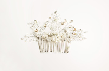 Cute hair clip with white pearls on a white background