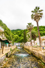 NEW ATHOS, ABKHAZIA - JUNE 11, 2017:Dam waterfall in New Athos, Abkhazia