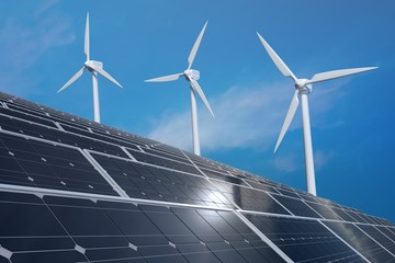 Solar photovoltaic panels and wind turbines. Alternative energy production and renewable power generation concept.