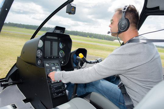 pilot operating a helicopter