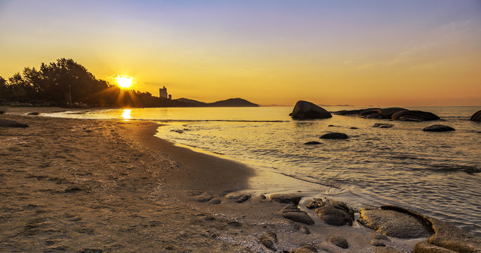 Beautiful seascape of Mae Pim beach during sunrise in Rayong province of Thailand.