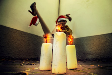 dummy body parts with Christmas decorations