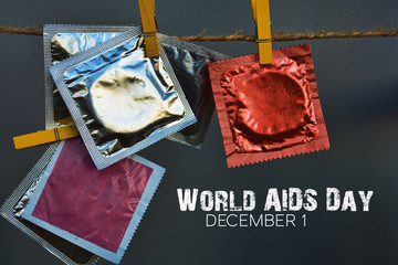 condoms on colorful clothespins . World AIDS Day