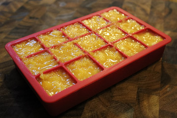 Closeup of peach puree in a silicone mold