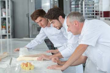 Obraz premium chef and apprentices