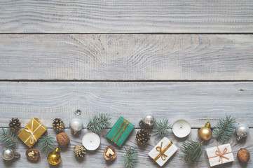 Christmas decorations on a white wooden surface. Top view