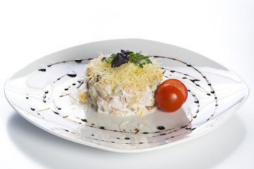 Russian salad on white plate