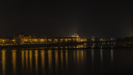 Fototapeta na wymiar View in autumn night Prague near Vltava river