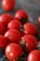 Fresh bright and juicy tomatoes on the kitchen