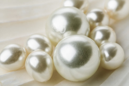 Multiple pearls in sea shell close up
