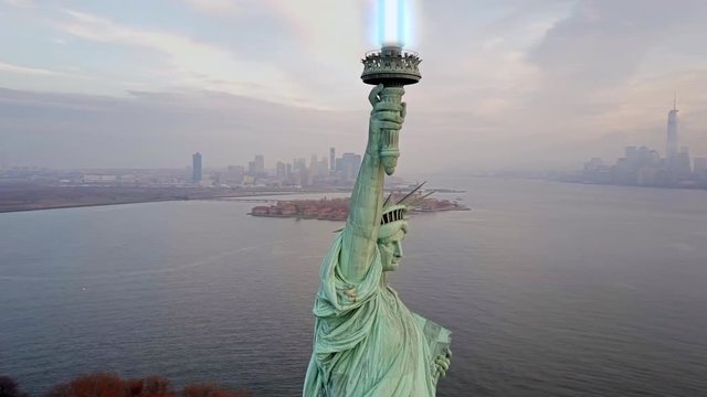 Aerial view of Statue of Liberty with Lightsaber 4k