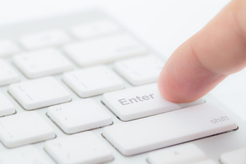 Hands of businessman with a computer keyboard.