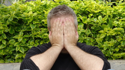 Ashamed Unshaven Caucasian Male