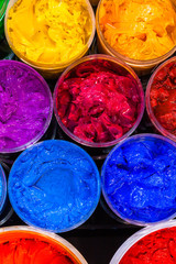 several plastisol ink cans in factory who use plastisol ink to
print tee shirt and print on fabric 