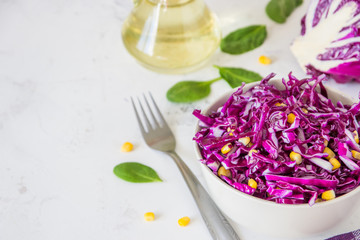 Fresh red cabbage salad with corn. Vegeterian and diet food. Space for text