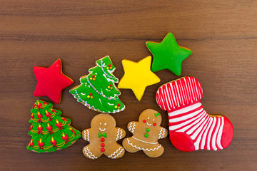 Festive tasty Christmas cookies on wooden table. Top view