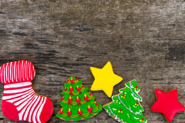 Festive tasty Christmas cookies on wooden table. Top view