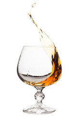 Splash of brandy in glass.