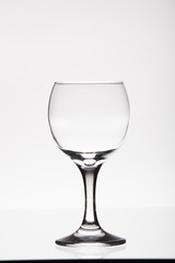 wine glass on thick leg on white background