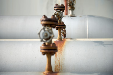 Corroded rust pipe leak with soft focus