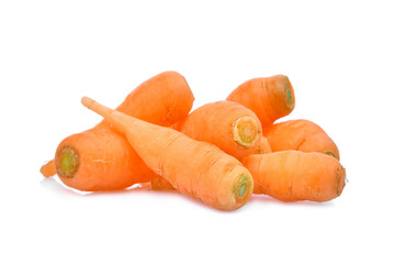 pile of baby carrots isolated on white background