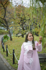 Portrait of japanese woman in autumn background