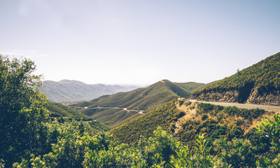 Travel to Yosemite National Park. A winding scenic road in the hills