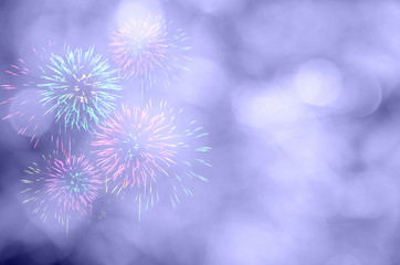 Fireworks celebration and the twilight sky background with bokeh.