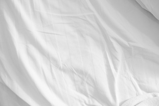 White delicate soft background of fabric or bedding sheet