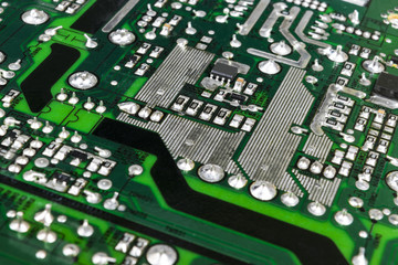 Circuitboard with resistors, microchips and electronic components. Electronic computer hardware technology. Integrated communication processor. Information engineering component. Semiconductor