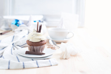 Chocolate cupcake with white cream