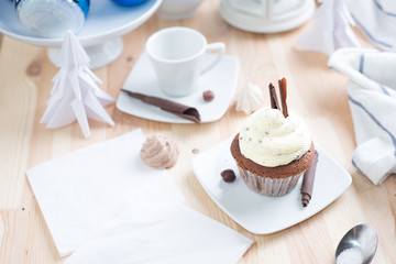 Chocolate cupcake with white cream
