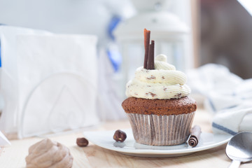 Chocolate cupcake with white cream