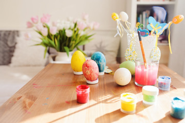 easter craft with kids - painting eggs at home. Seasonal spring decorations