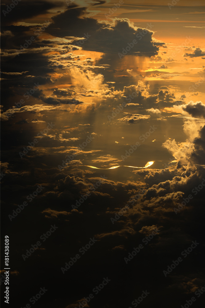 Wall mural sunset white cloud sky at high level attitude, view from window airplane