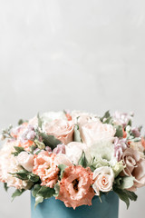 Luxury bouquets of mix flowers in the hat box. vintage color