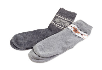 Different wool thermal socks on a white background