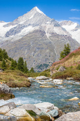 Snow capped mountain, glacier and valley
