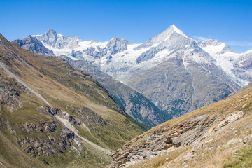 Fototapeta na wymiar Snow capped mountain, glacier and valley